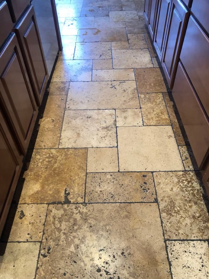 Stone tile hallway before cleaning