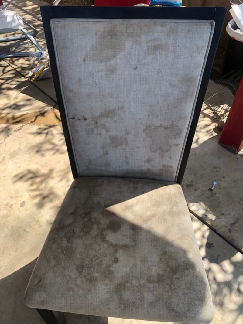 Upholstered chair before cleaning