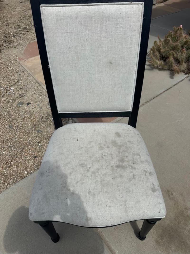 Upholstered chair before cleaning